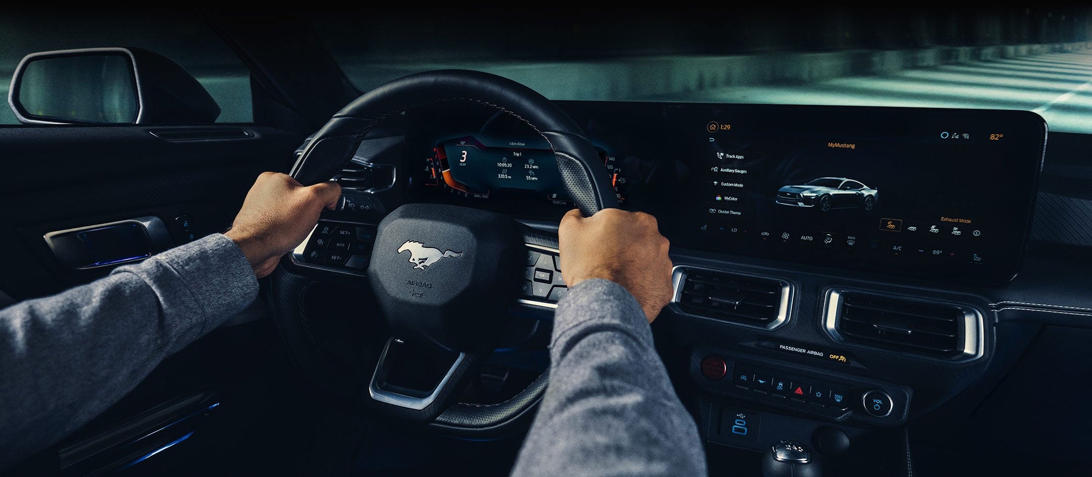 A 2024 Ford Mustang® model interior with a person driving | Palm Coast Ford in Palm Coast FL
